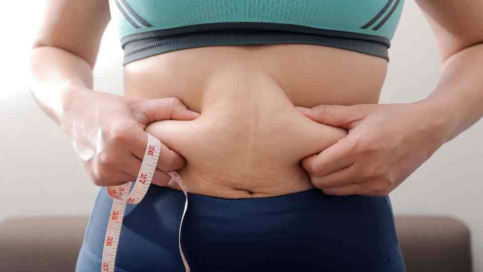 Stomach rolls with tape measure for weight loss
