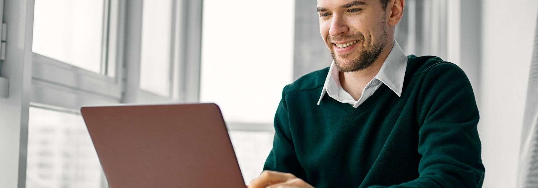 man using laptop