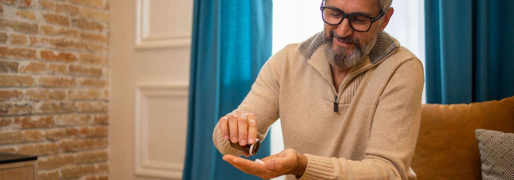 man taking pill