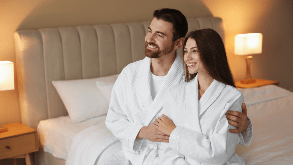 man woman in bed